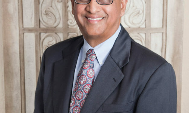 E. John Serrão, MD, FACOG