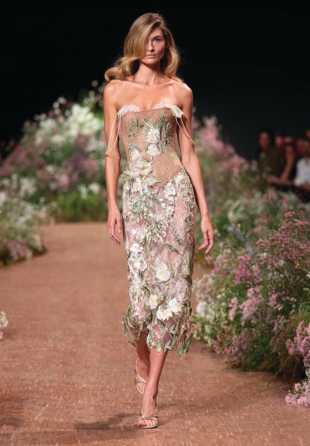 Elie Saab Spring/Summer 2027, Look 1 Model in a floral-embroidered lace corset dress on the Elie Saab Spring/Summer 2027 wildflower runway
